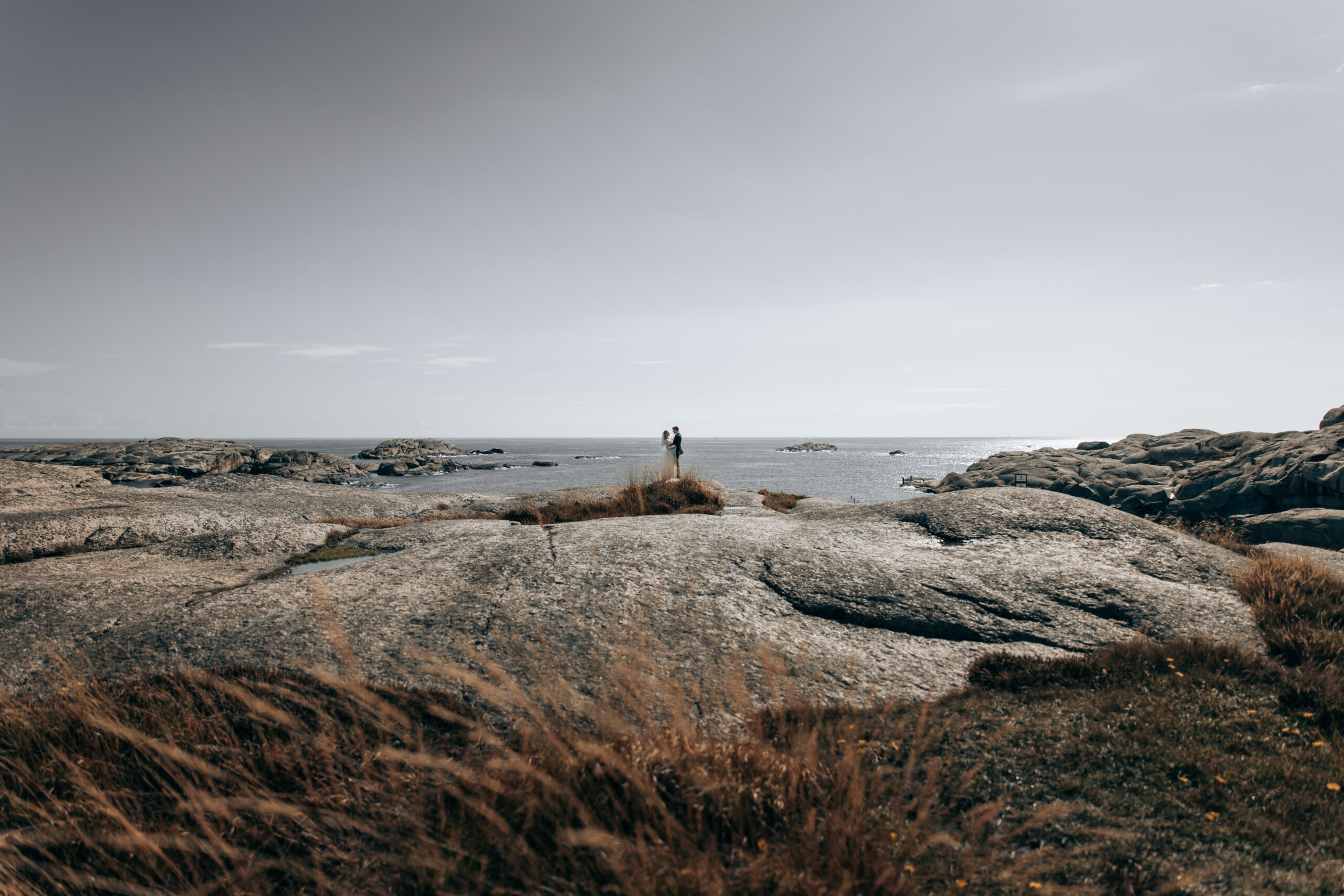 Cover image of a married couple looking out at sea